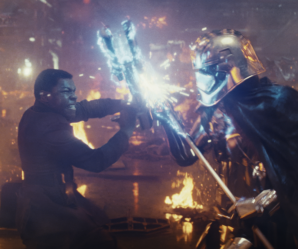 Star Wars: The Last Jedi..L to R: Finn (John Boyega) battling Captain Phasma (Gwendoline Christie)..Photo: Lucasfilm Ltd. ..© 2017 Lucasfilm Ltd. All Rights Reserved.