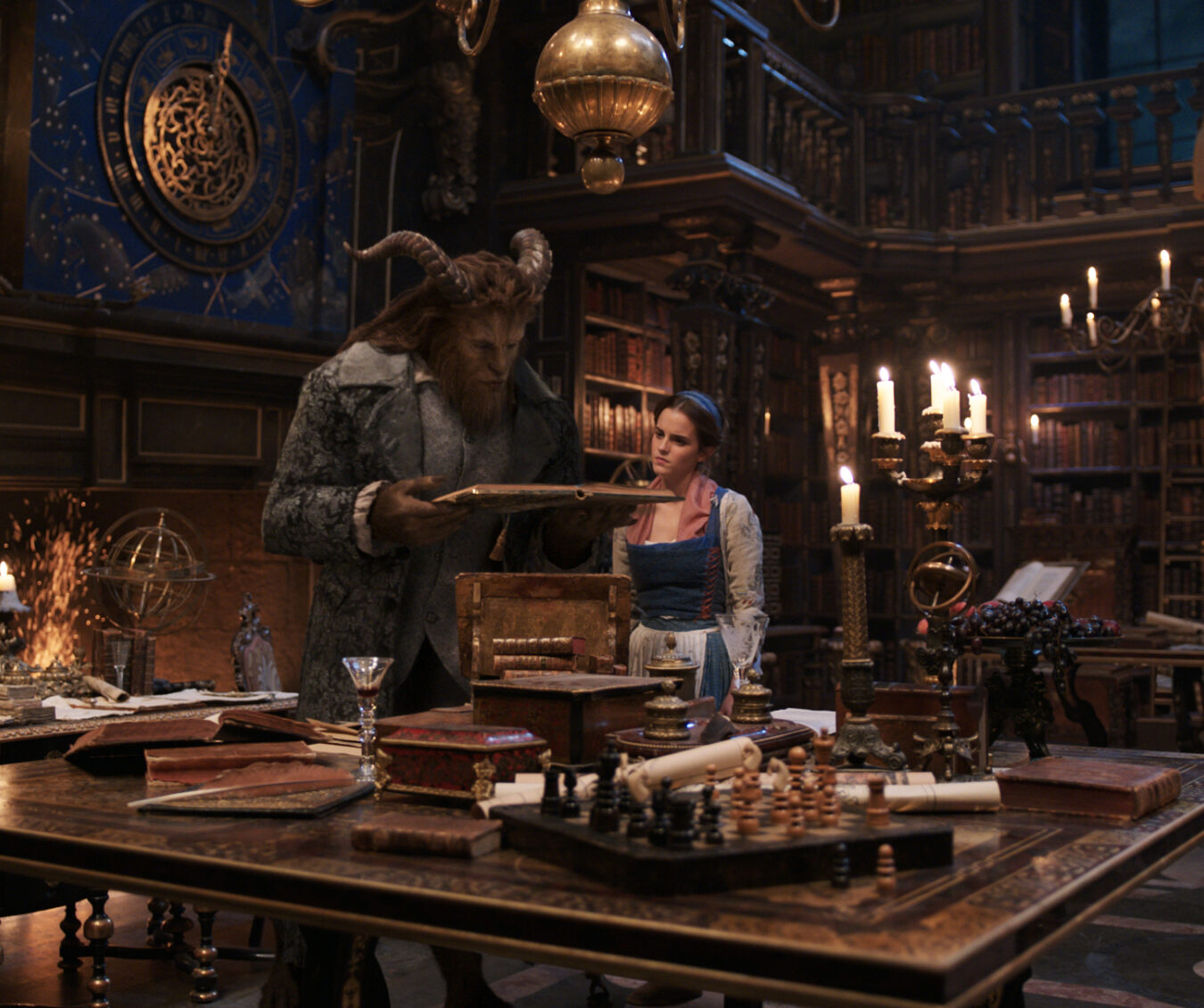 The Beast (Dan Stevens) and Belle (Emma Watson) in the castle library in Disney's BEAUTY AND THE BEAST, a live-action adaptation of the studio's animated classic which is a celebration of one of the most beloved stories ever told.