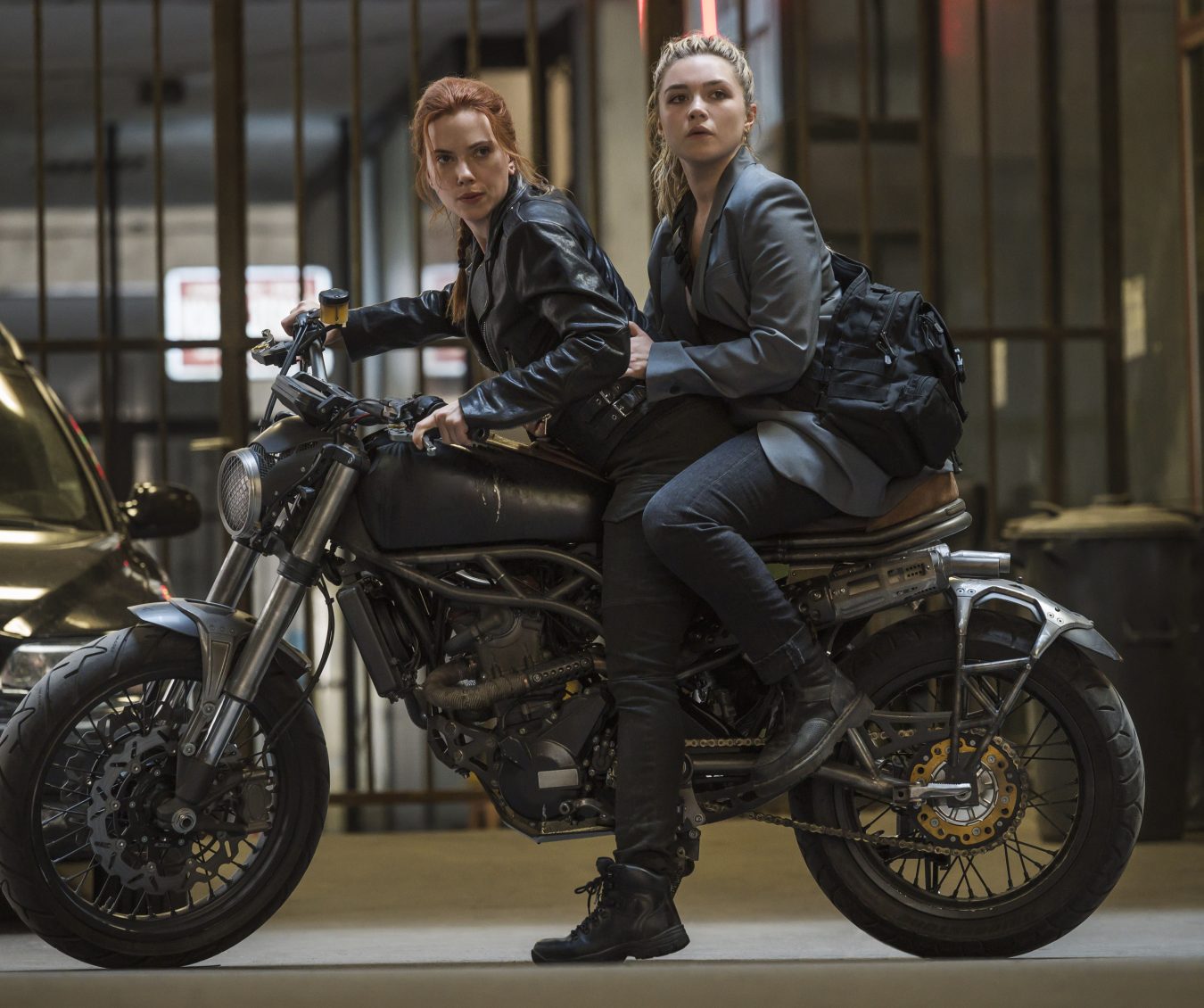 Scarlett Johansson as Black Widow/Natasha Romanoff and Florence Pugh as Yelena in Marvel Studios' BLACK WIDOW. Photo by Jay Maidment. ©Marvel Studios 2020. All Rights Reserved.
