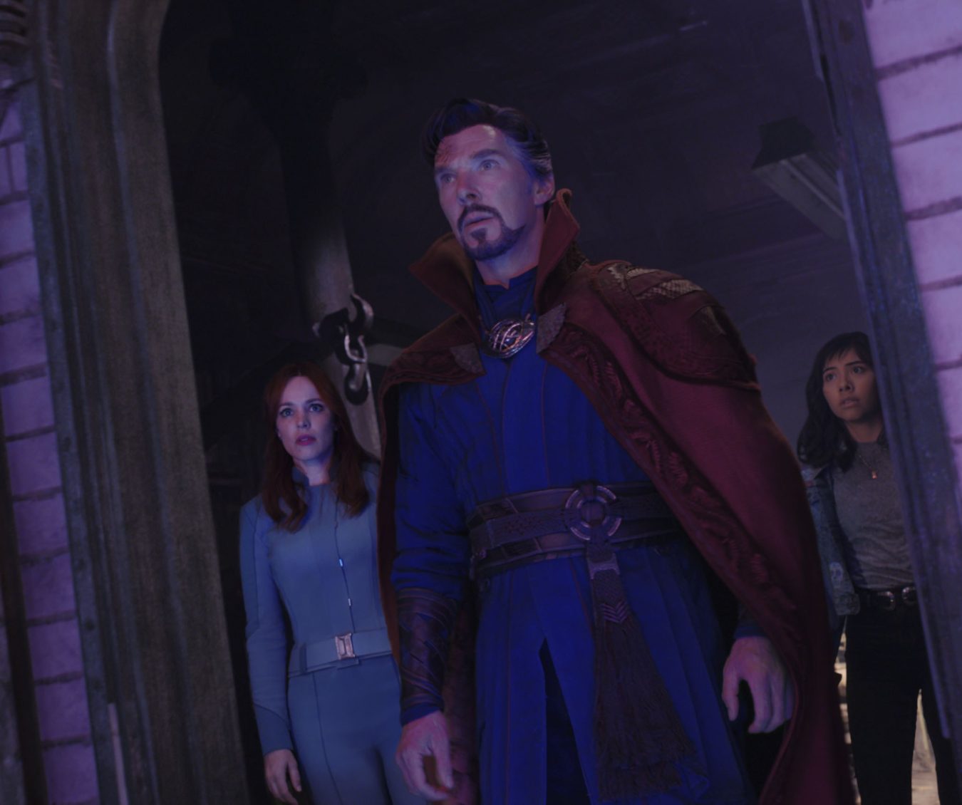 (L-R): Rachel McAdams as Dr. Christine Palmer, Benedict Cumberbatch as Dr. Stephen Strange, and Xochitl Gomez as America Chavez in Marvel Studios' DOCTOR STRANGE IN THE MULTIVERSE OF MADNESS. Photo courtesy of Marvel Studios. ©Marvel Studios 2022. All Rights Reserved.