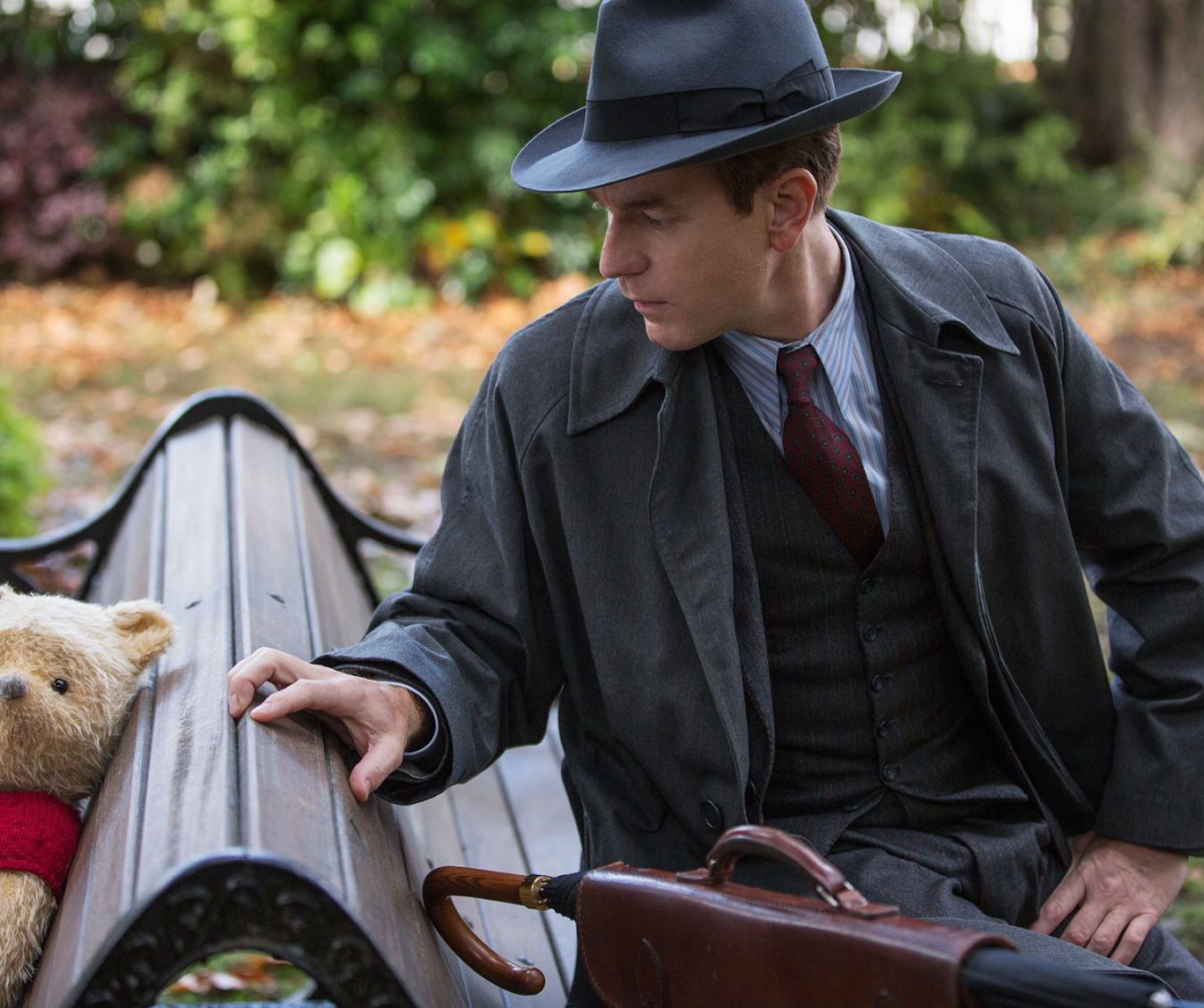 Christopher Robin (Ewan McGregor) with his longtime friend Winnie the Pooh in Disney’s CHRISTOPHER ROBIN.
