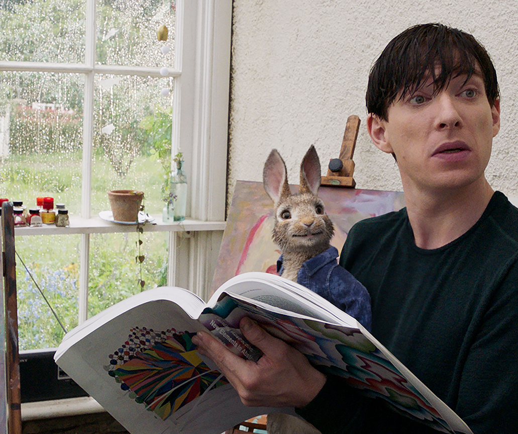 Peter Rabbit (James Corden) with Mr. McGregor (Domhnall Gleeson) in Columbia Pictures' PETER RABBIT.